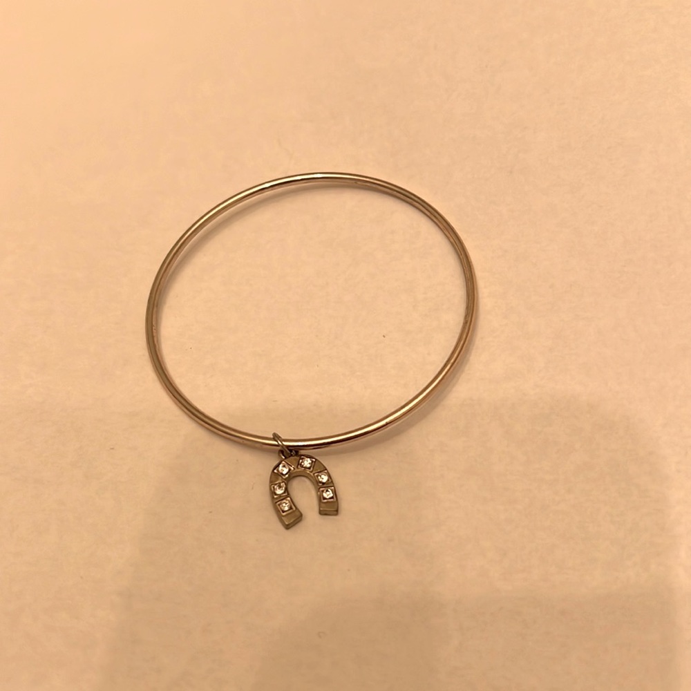 Gold plated horseshoe charm bangle bracelet
